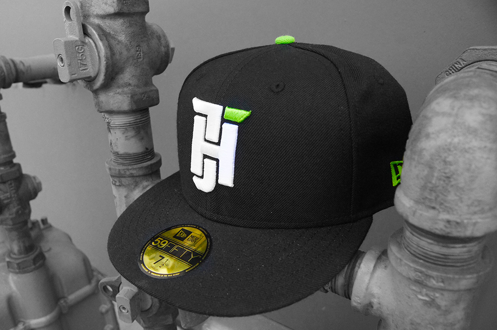 Structured cap mockup featuring the Just Hats mark